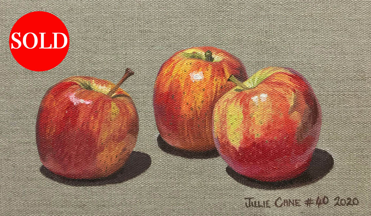 Oil Painting still life by Julie Cane of pink lady apples